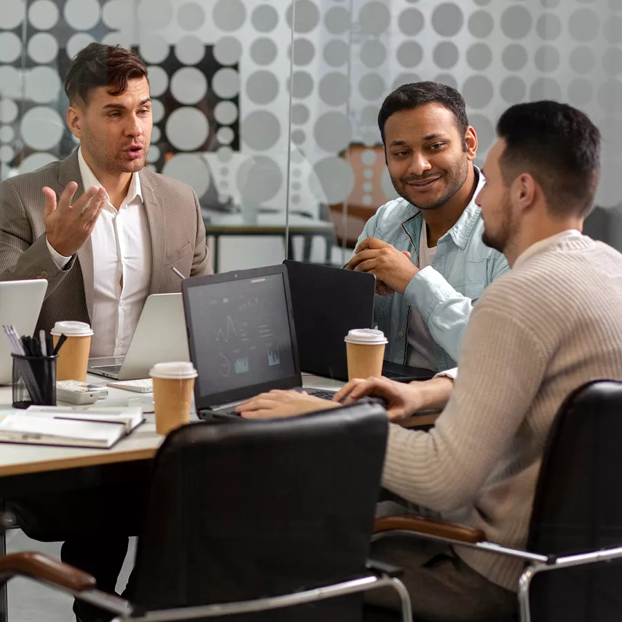 Business professionals discussing Mainland company formation in the UAE